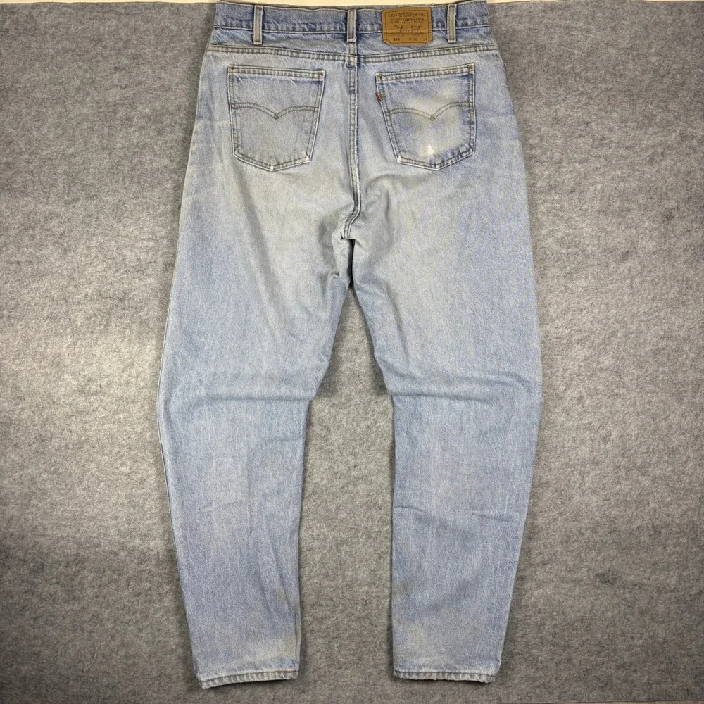 Vintage 90s Levis 550 Orange Tab Jeans Light Wash Relaxed Tapered Made in USA 38